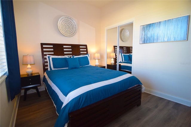 bedroom featuring dark hardwood / wood-style flooring