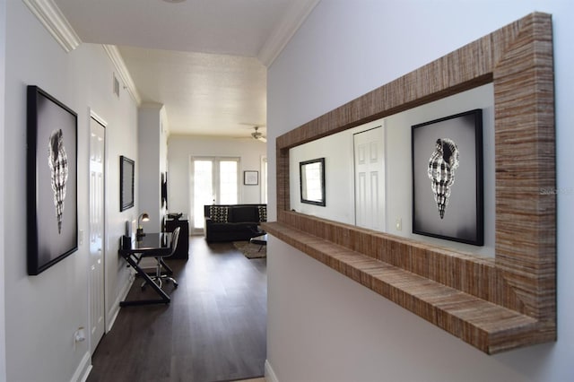 corridor with crown molding and dark hardwood / wood-style flooring