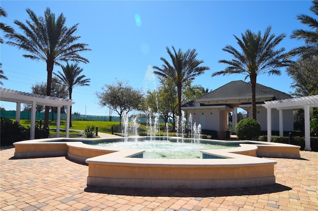 view of home's community featuring a pergola