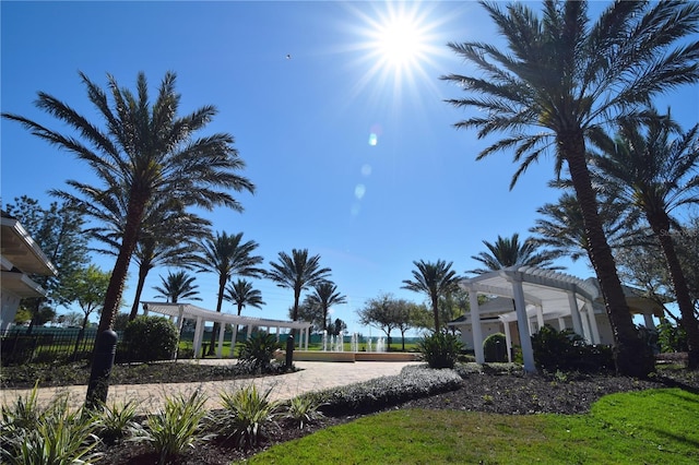 view of home's community with a pergola