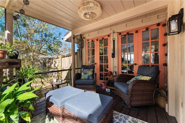 wooden terrace featuring french doors