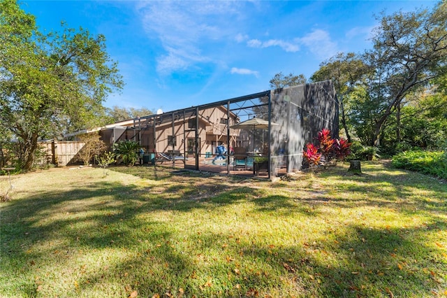 view of yard with a lanai