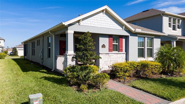 view of front of home with a front yard