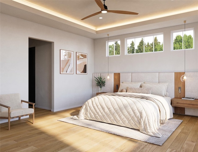 bedroom with ceiling fan and light wood-type flooring