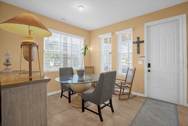 dining room with light tile patterned floors