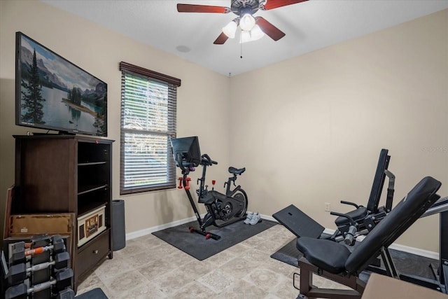 workout room featuring ceiling fan