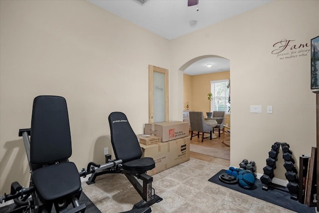 exercise area with ceiling fan