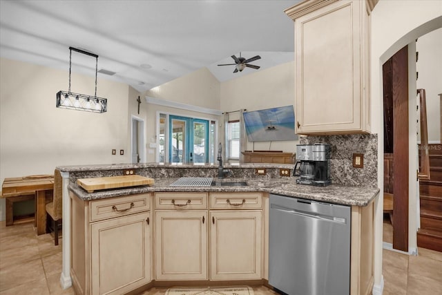 kitchen featuring sink, vaulted ceiling, stainless steel dishwasher, ceiling fan, and light tile patterned flooring