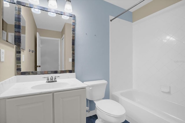 full bathroom featuring vanity, toilet, and tiled shower / bath combo