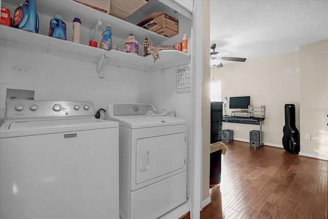 laundry area with washing machine and dryer, ceiling fan, and dark hardwood / wood-style floors