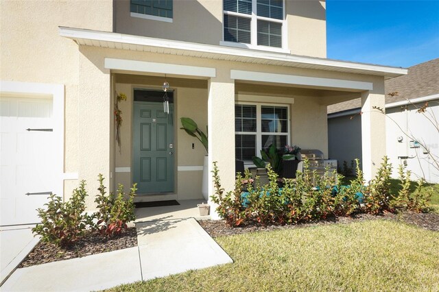 entrance to property with a porch