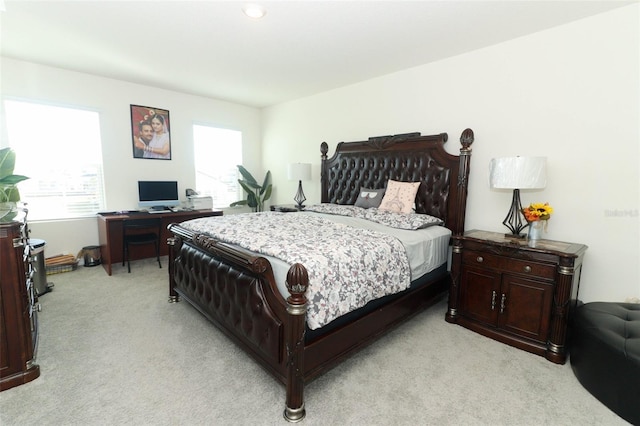 bedroom with light carpet