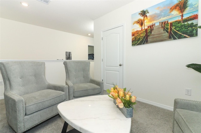 living area with carpet flooring