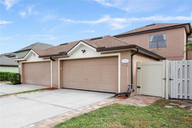 view of front of property with a garage