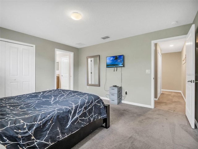 carpeted bedroom with a closet