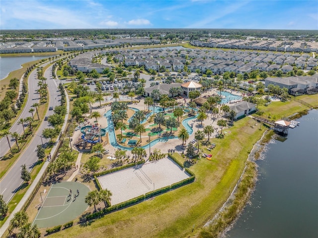 birds eye view of property featuring a water view