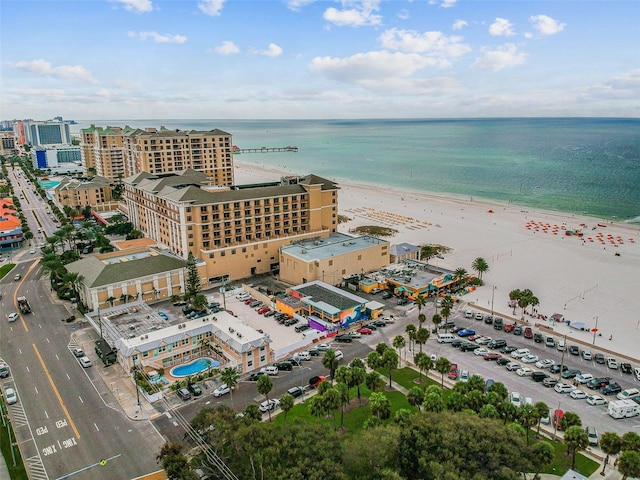 drone / aerial view with a view of the beach and a water view