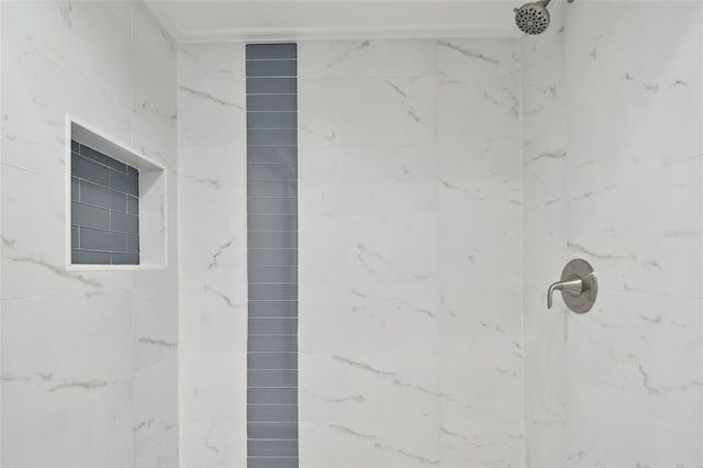 bathroom featuring tiled shower