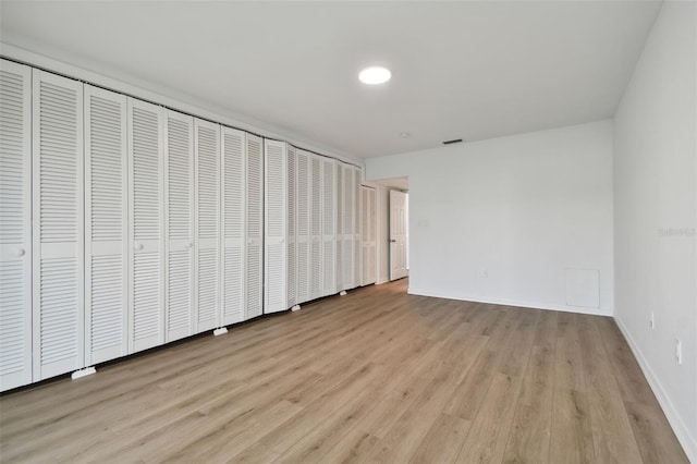 unfurnished bedroom featuring light hardwood / wood-style floors