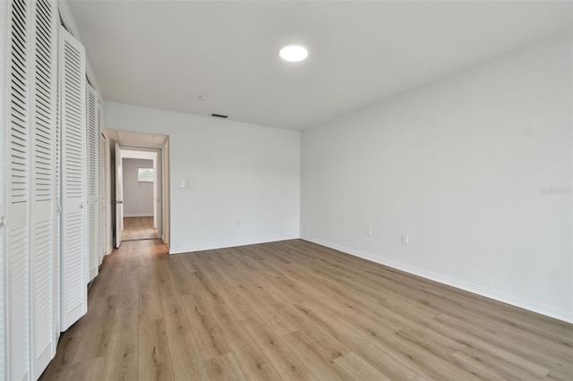 unfurnished bedroom featuring light hardwood / wood-style floors