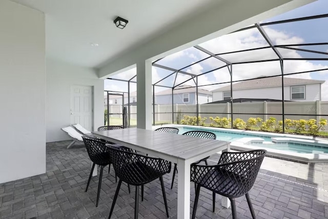 view of patio / terrace with a lanai and a fenced in pool