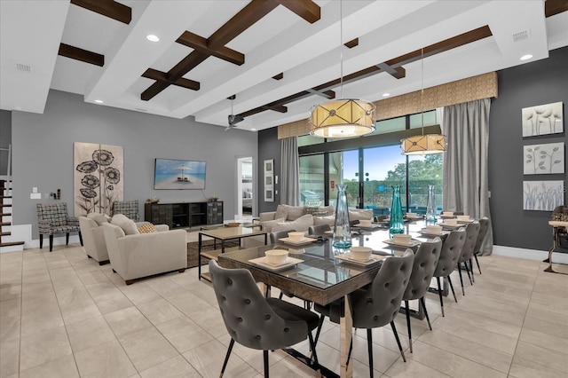 dining room featuring light tile patterned floors and beam ceiling