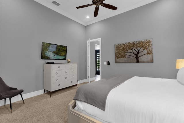 bedroom featuring ceiling fan, light colored carpet, and ornamental molding