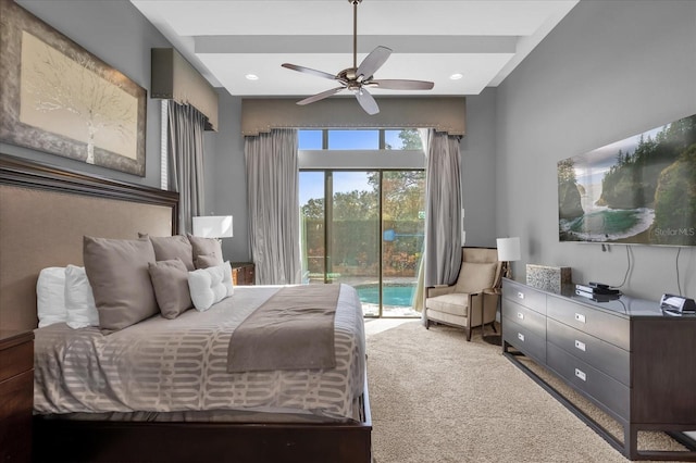 bedroom featuring carpet flooring, ceiling fan, and access to outside