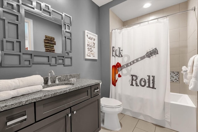 full bathroom featuring tile patterned flooring, vanity, shower / bath combo, and toilet