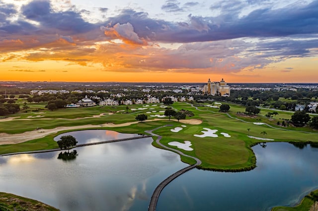 aerial view at dusk with a water view