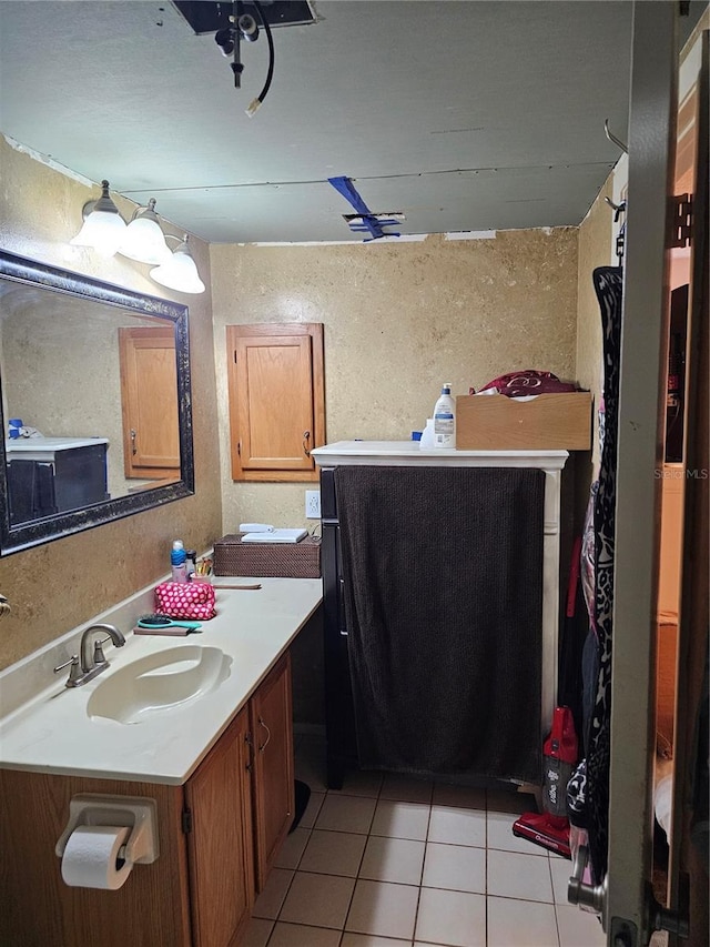 bathroom featuring tile patterned floors and vanity