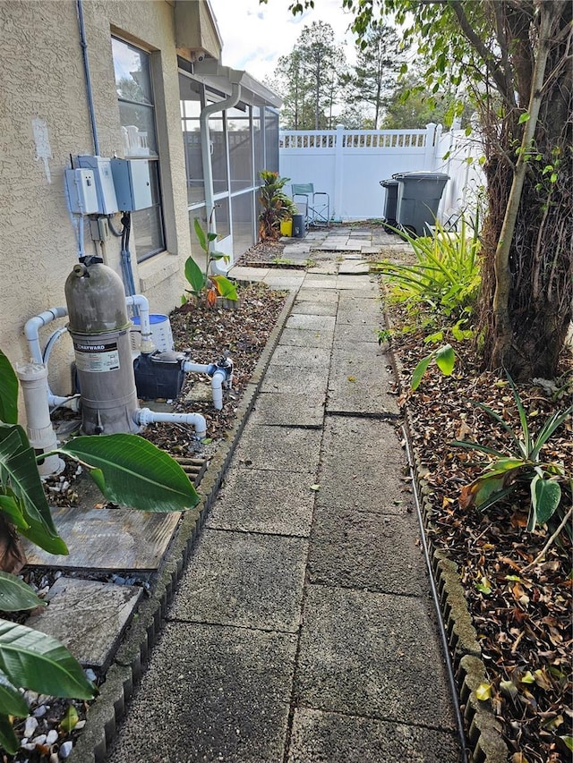 view of yard with a sunroom