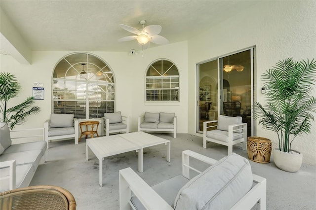 view of patio featuring an outdoor hangout area and ceiling fan