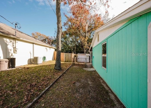 view of yard featuring central AC unit