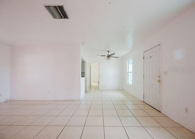 interior space featuring ceiling fan