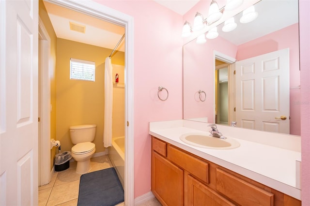 full bathroom featuring tile patterned flooring, shower / bath combo, toilet, and vanity