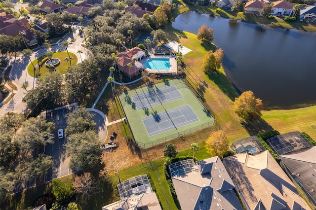 birds eye view of property featuring a water view