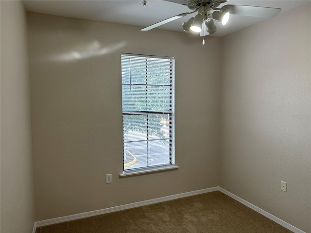 unfurnished room featuring carpet flooring and ceiling fan