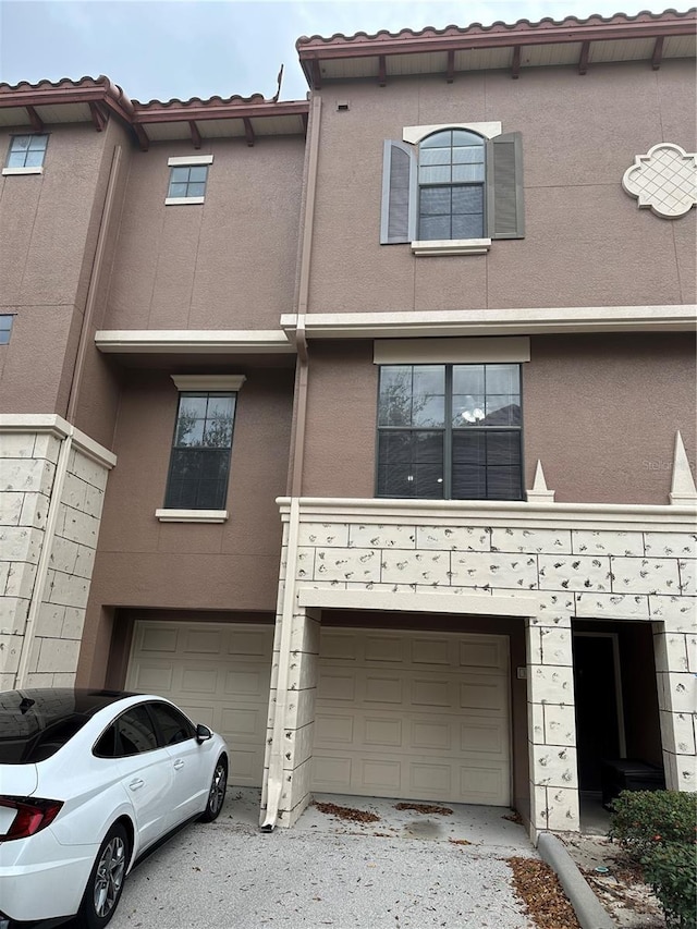 view of front of property featuring a garage