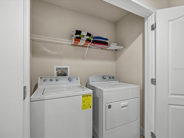 washroom featuring separate washer and dryer