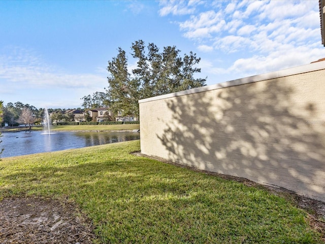 exterior space with a water view