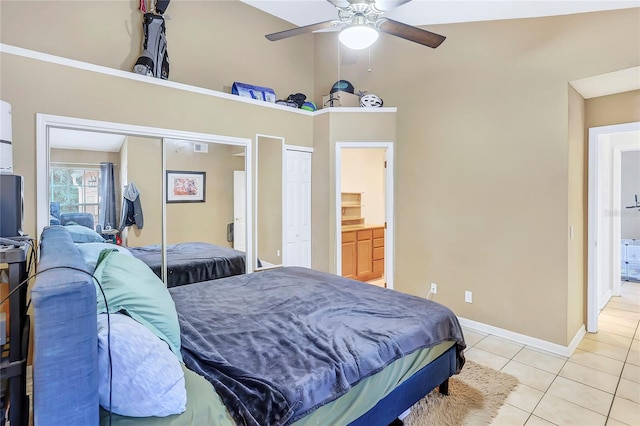 tiled bedroom featuring high vaulted ceiling and ceiling fan