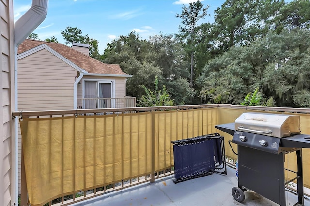 view of patio / terrace featuring area for grilling and a balcony