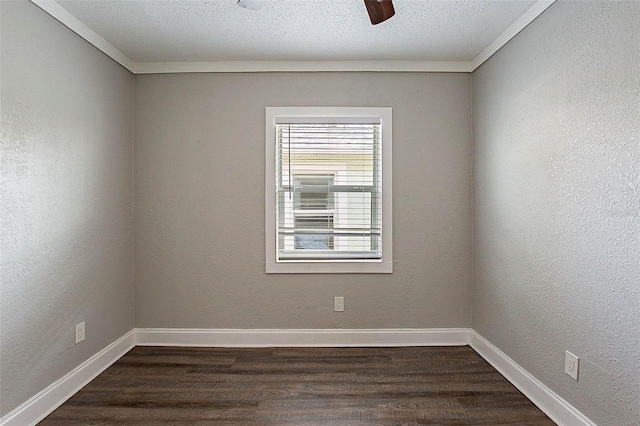 unfurnished room with a textured ceiling, ceiling fan, dark hardwood / wood-style floors, and ornamental molding