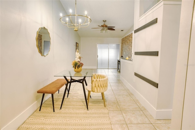 corridor featuring light tile patterned floors and a chandelier