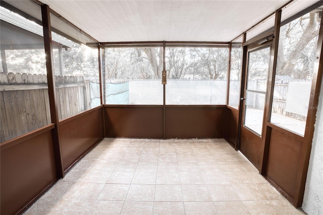 sunroom / solarium featuring wooden ceiling