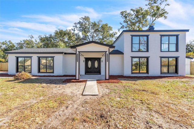 view of front of property with a front lawn