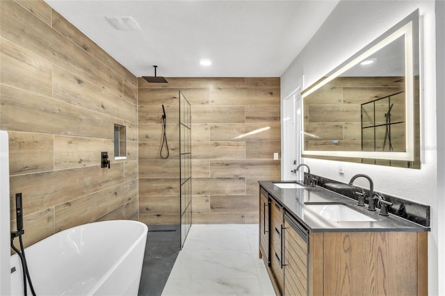 bathroom featuring vanity, plus walk in shower, and wood walls