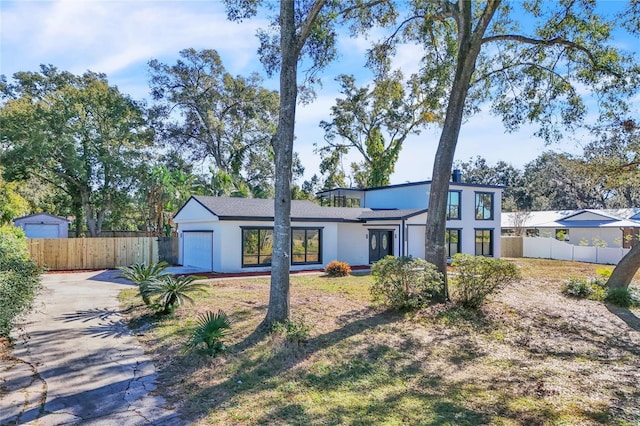 view of front of property featuring a garage