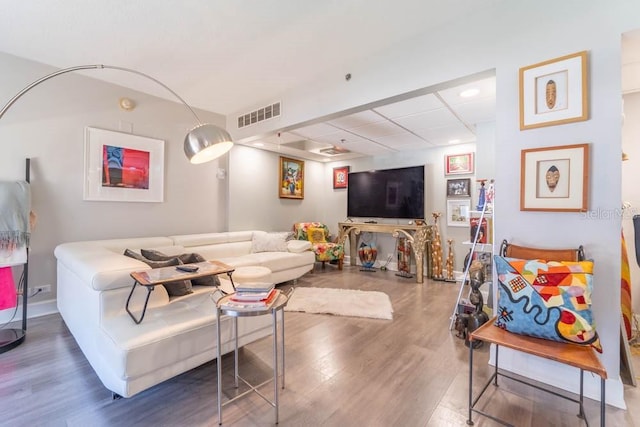 151 E Washington St Unit 201, Orlando, FL 32801 - living room with wood finished floors and recessed lighting